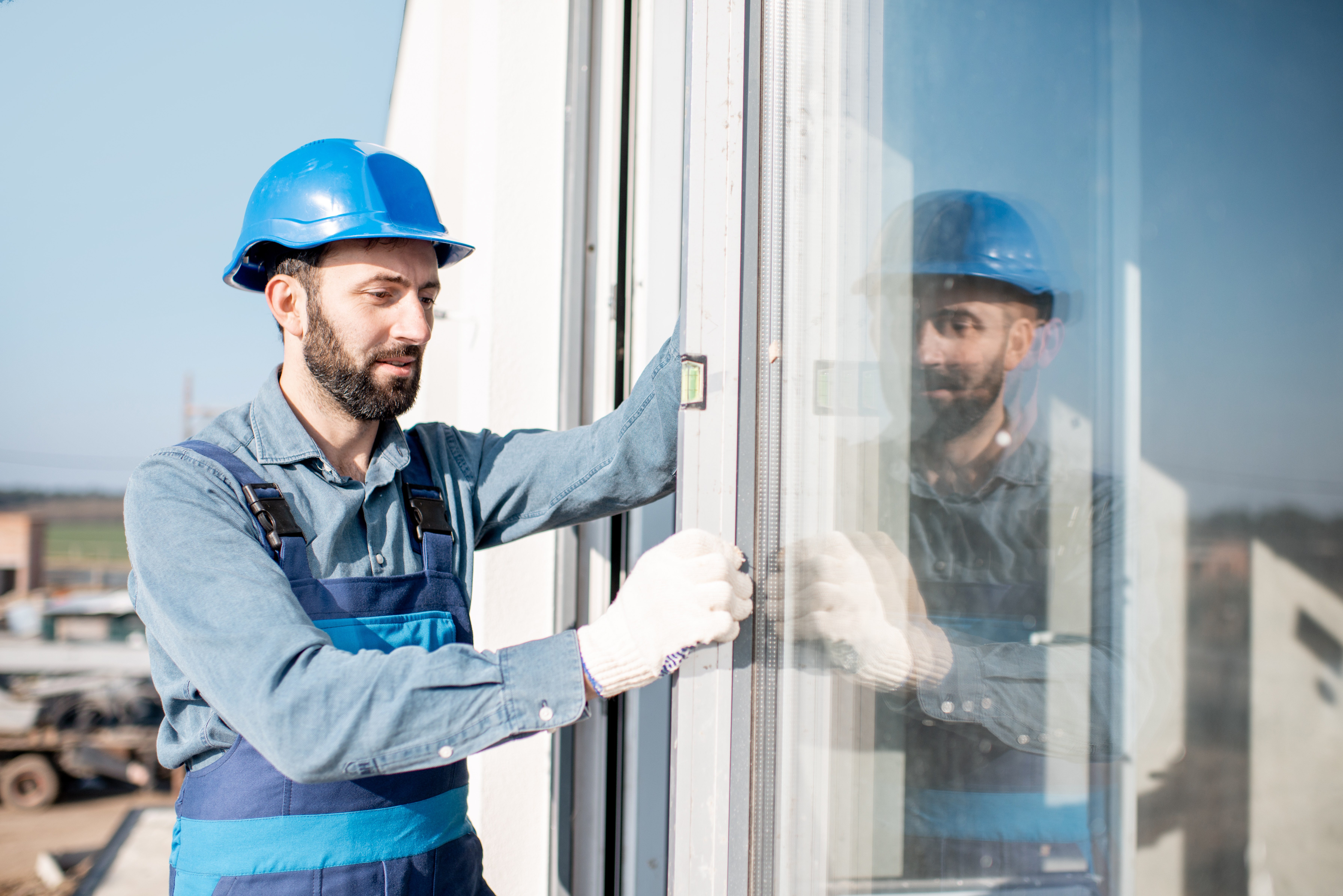 Window being installed during a renovation project
